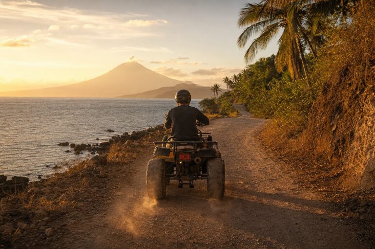 An ATV riding a coastal dirt road near Legazpi at golden hour